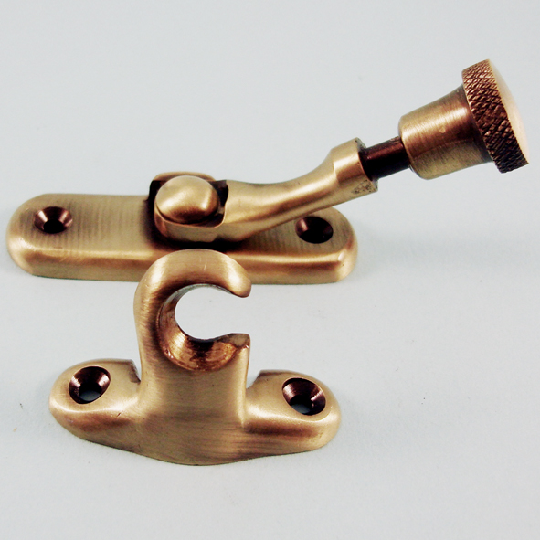 THD110/AB • Non-Locking • Antique Brass • Swing Arm Brighton Pattern Sash Fastener